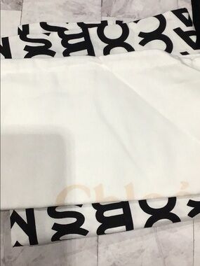 cloe and mark Jacobs dust bag